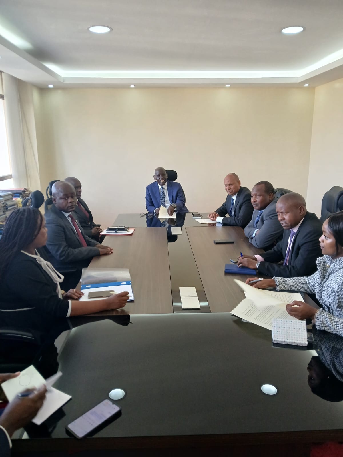Principal Secretary State Department for Immigration and Citizen Services Dr. Belio Kipsang chairing a consultative meeting, and on the immediate left is the Principal Secretary State Department for Shipping and Maritime Affairs Aden Millah.