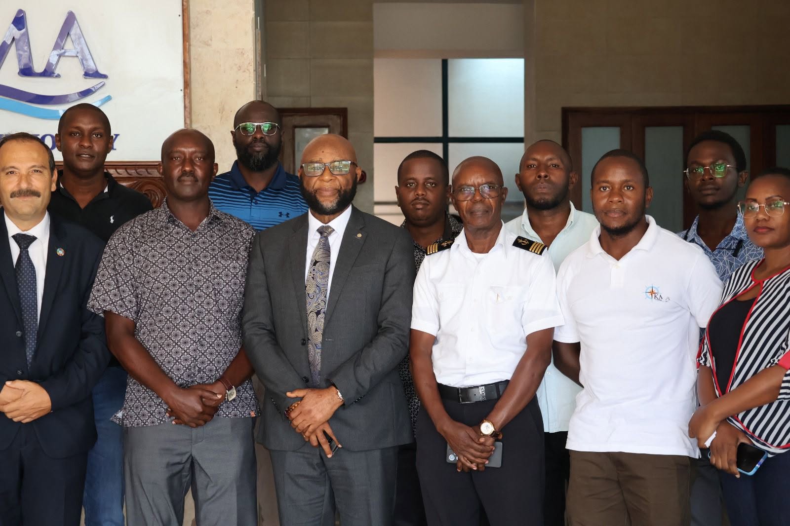 Maj. (Rtd.) George N. Okong’o, Head of Technical, State Department for Shipping and Maritime Affairs second from right posing for a photo after the National Validation and Stakeholder Consultation Workshop on the Assessment of National Assets and Identification of National Priorities for Port Security and Safety of Navigation