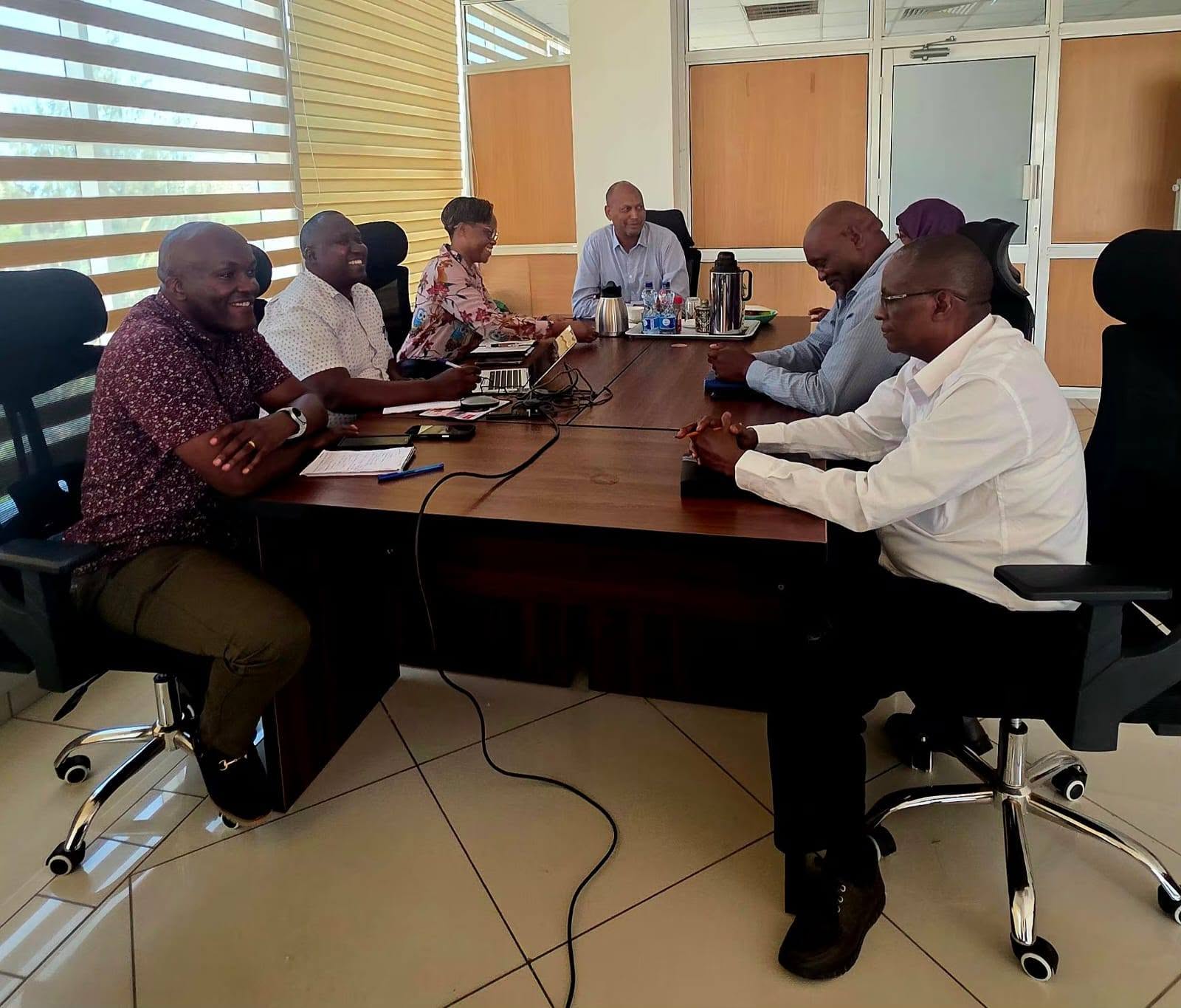 PS Millah chairing a strategic meeting with KNSL management.