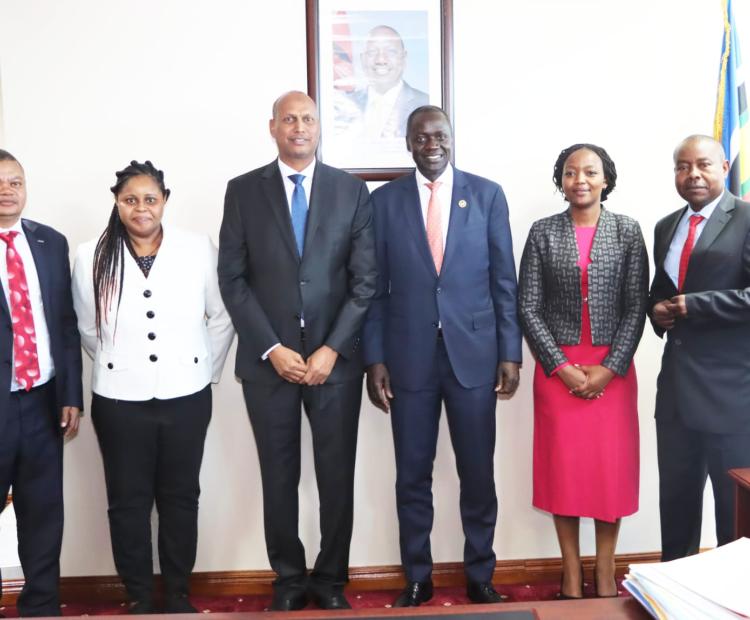Principal Secretary State Department for Shipping and Maritime Affairs Mr. Aden Millahin the middle, posing for a photo with Kenya's High Commissioner to the United Kingdom and Northern Ireland Amb. Maurice Makoloo after the ambassador paid a courtesy call to the PS.