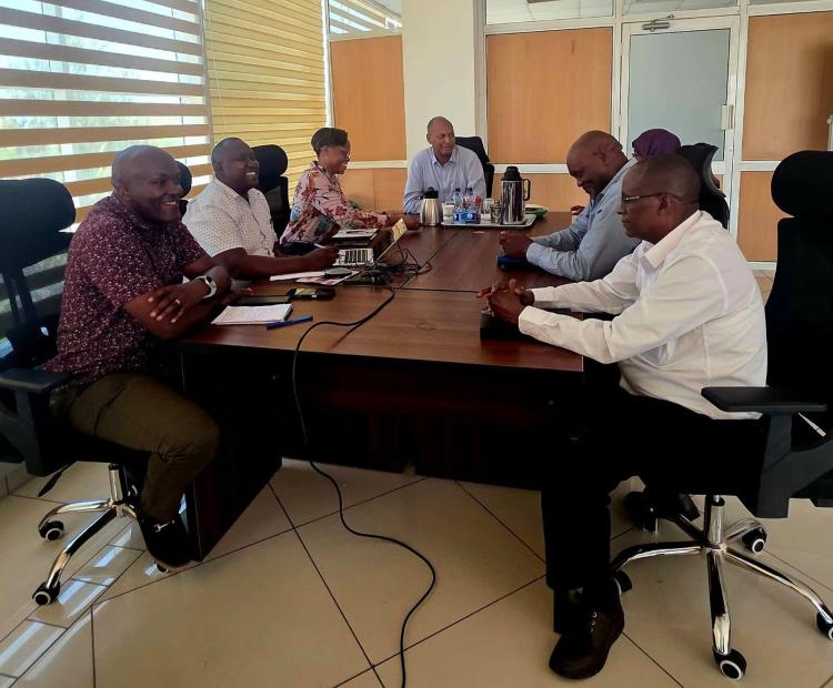 PS Millah chairing a strategic meeting with KNSL management.
